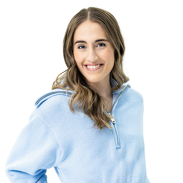 Young woman looking at the camera, smiling
