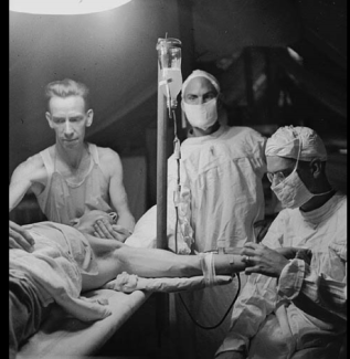 Image of Patient receiving blood transfusion during WWII