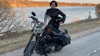 Dora with her Motorcycle
