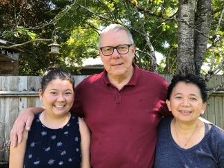 Lourdess Sumners, left, with her parents Orlando and Regina Sumners. 