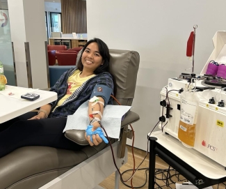 Blood and plasma donor in donation chair