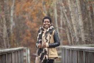 Revée Agyepong smiling and standing outdoors