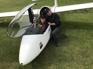 Jason and his daughter after her first solo flight.