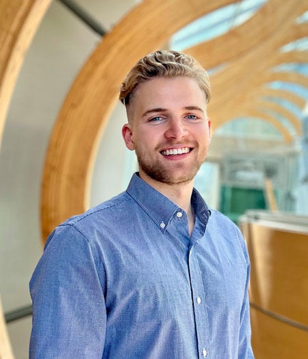 Colton Strong headshot wearing a blue shirt