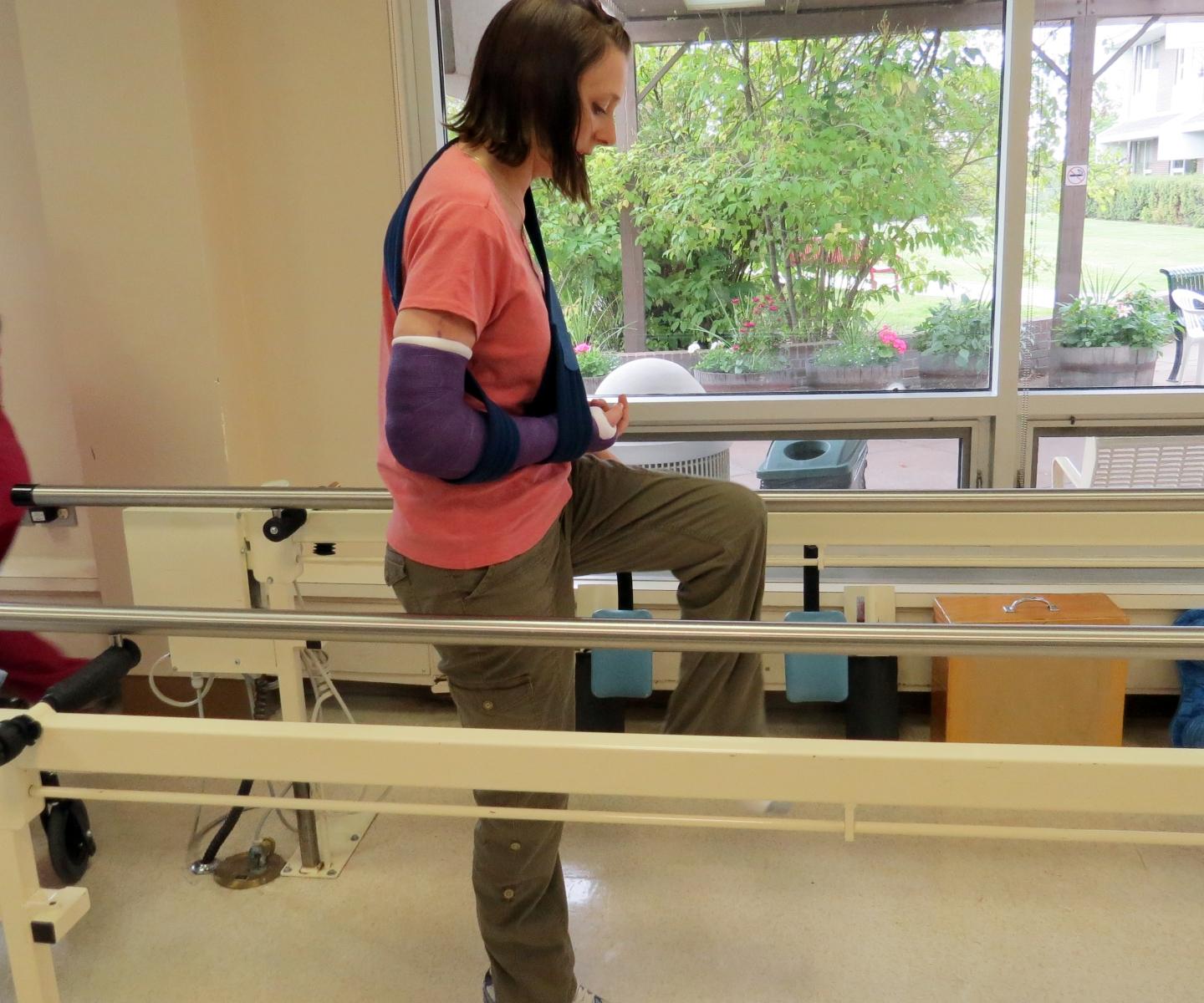 blood recipient learning to walk in physio