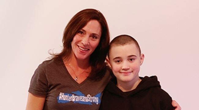 A young cancer patient with his mother 